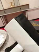Christian Louboutin Astrilarge Booty 100 black and white leather boots