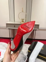 Christian Louboutin Astrilarge Booty 100 black and white leather boots