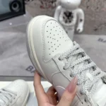 Louis Vuitton x Nike SB Dunk Low Grey And White Sneaker